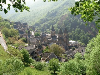 Medieval Conques, perched above the lush river valley below. 