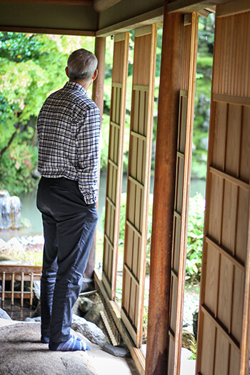 man standing in a Japanese ryokan