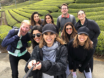 travellers in Japan smiling