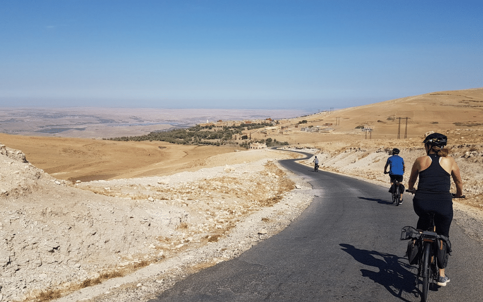 B&R travellers biking through the Agafay desert